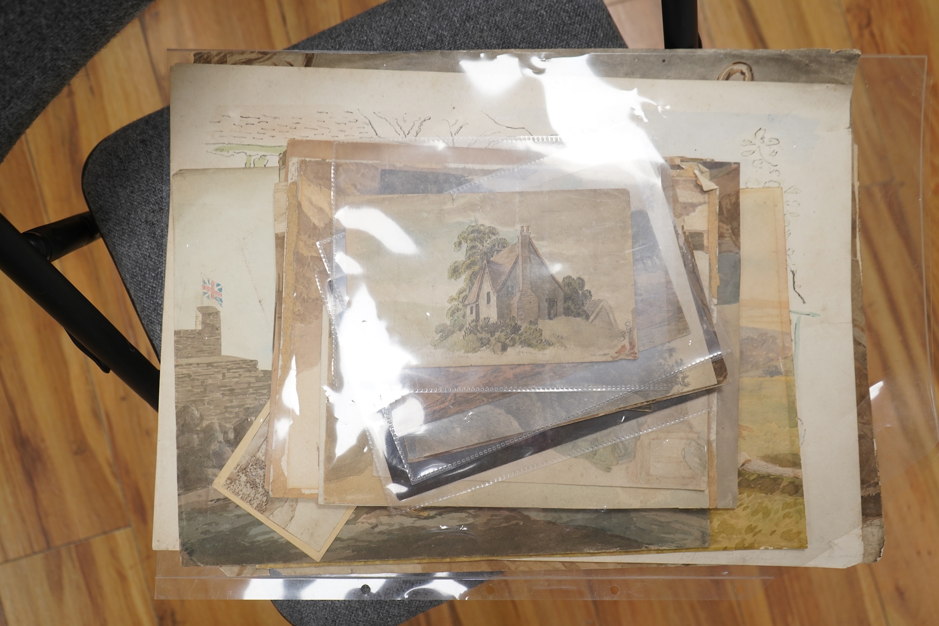 A collection of 18th and 19th century inks, watercolours and pencil sketches, predominantly landscapes and figural works, unsigned, unframed, largest 34 x 46cm